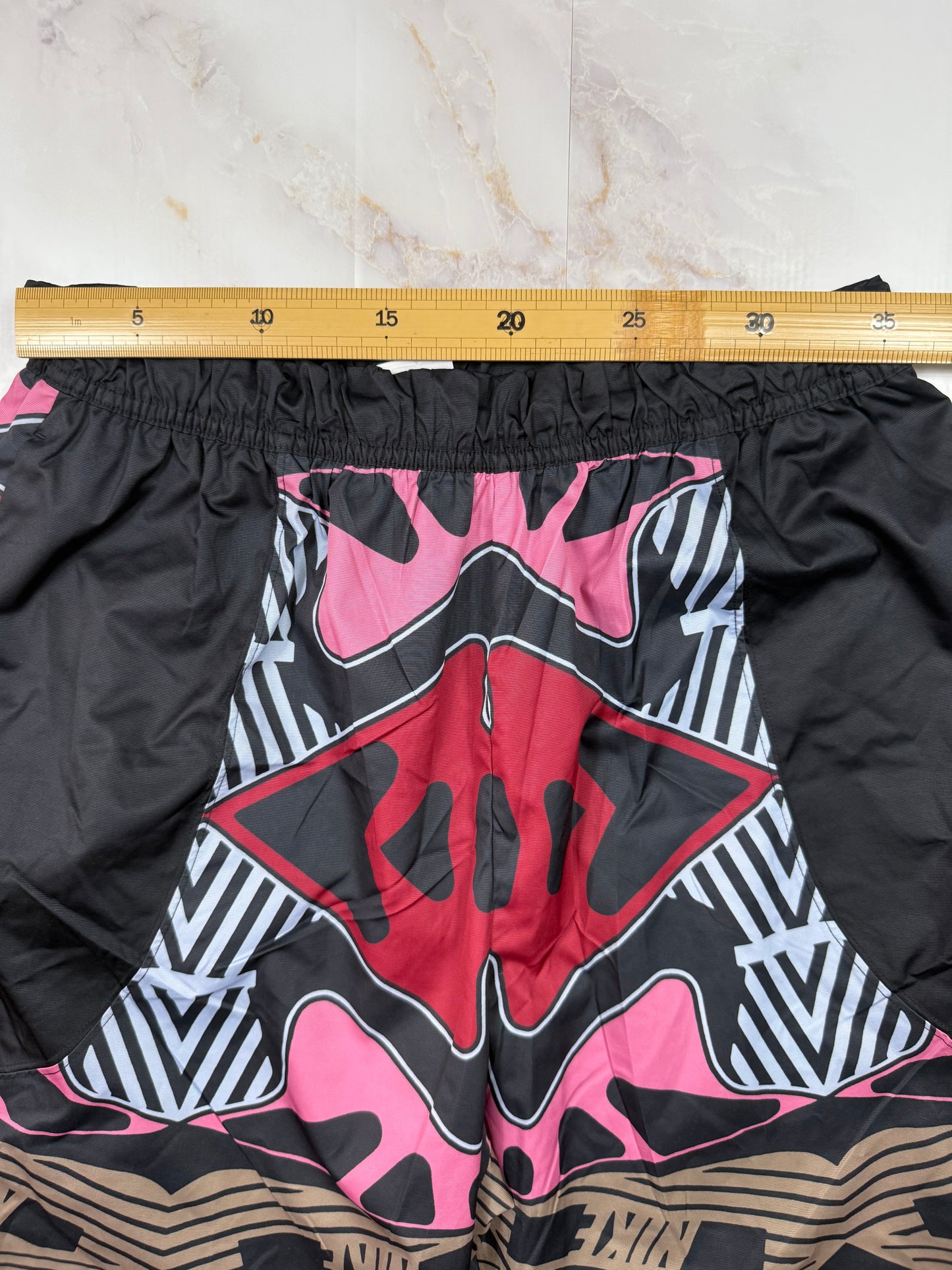 【NIKE】総柄 トラックパンツ Mサイズ マルチカラー ブラック ピンク レッド ストリート スポーツウェア