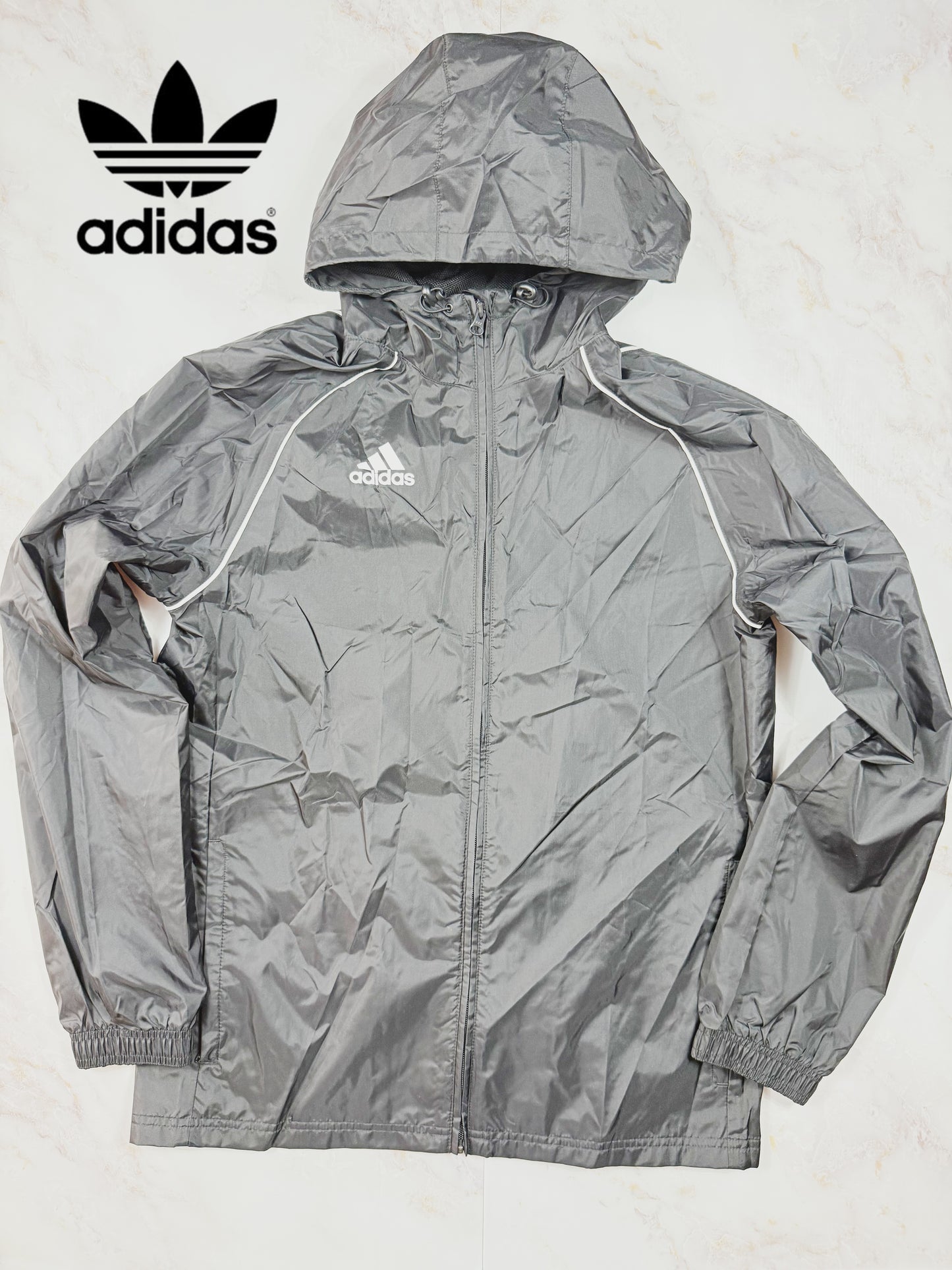 【adidas】フード付き ナイロンジャケット グレー Lサイズ相当 CORE18 RN JKT メンズ アディダス ウインドブレーカー