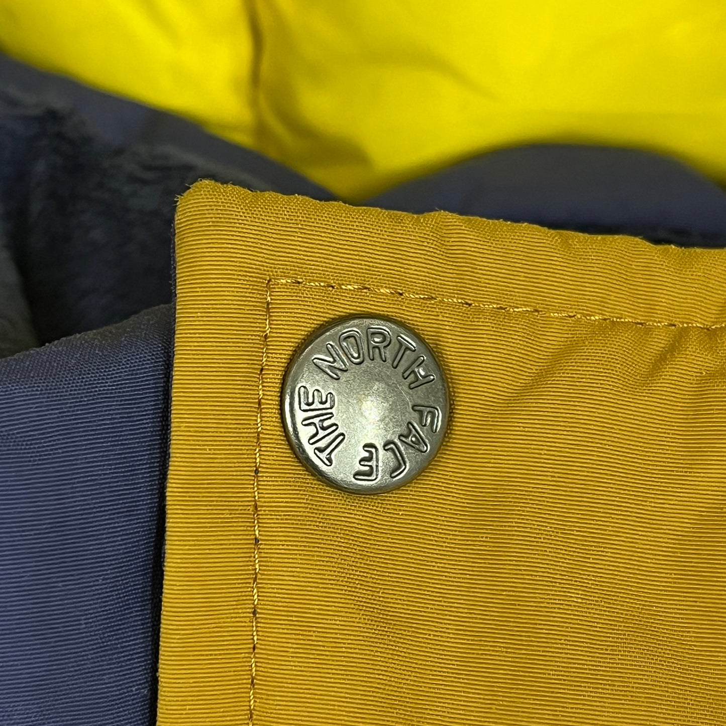 【THE NORTH FACE】キッズ マクマードデザイン ダウンジャケット 130cm PROHEAT搭載 マスタード/ネイビー #160