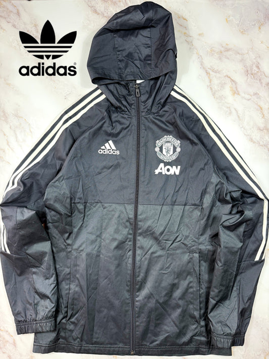 【adidas × Manchester United】マンチェスター・ユナイテッド AON スポンサーロゴ入り ウィンドブレーカー パーカー ブラック Lサイズ相当